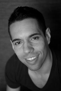 Black and white headshot of Dexandro Montalvo